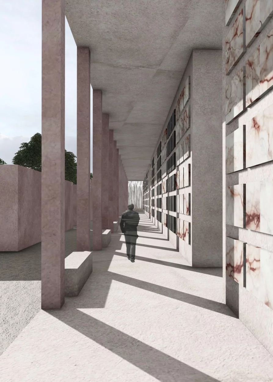 Vnitřek krematoria s mramorovými stěnami a betonovými sloupy.